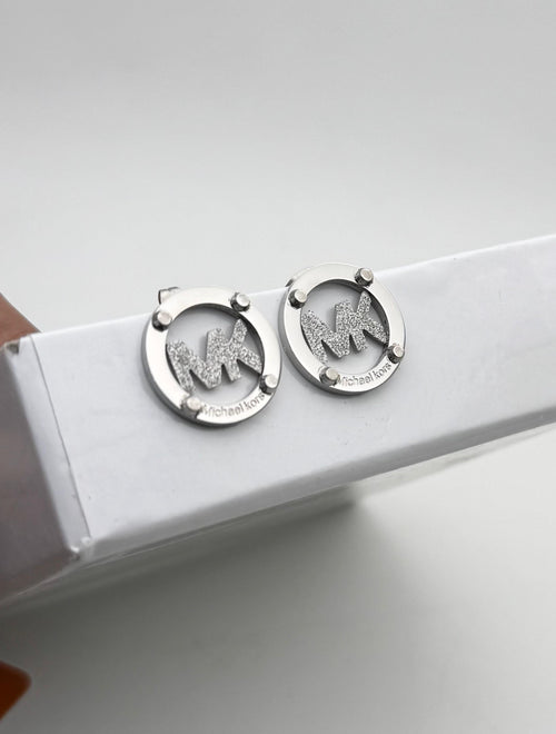 MK Logo Earnings